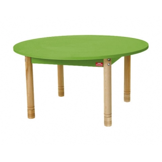 Ronde lage tafel met een groen blad